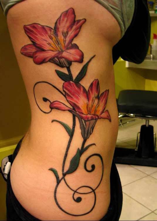 koi fish with lilly pad and flower tattoo   Iris and lilly flowers tattoo